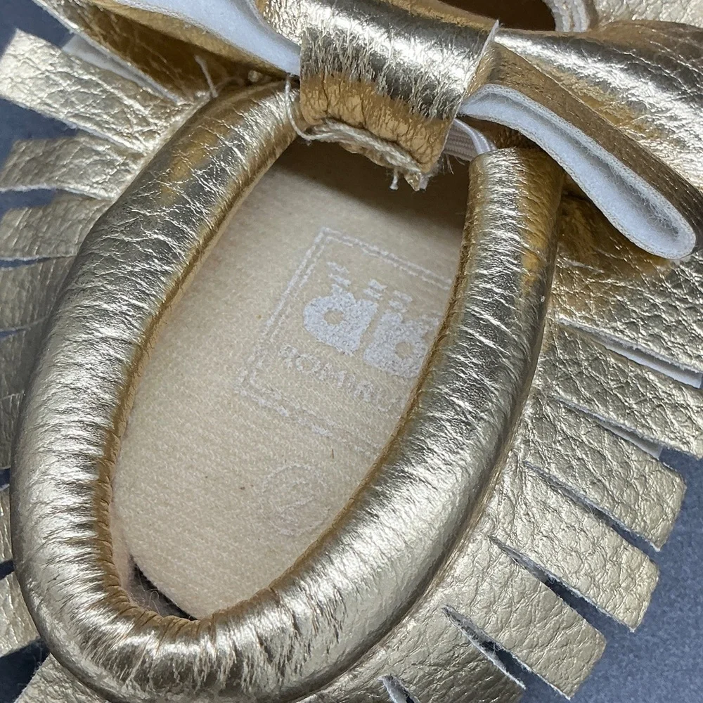 Romirus Metallic Gold Bow Fringe Moccasins